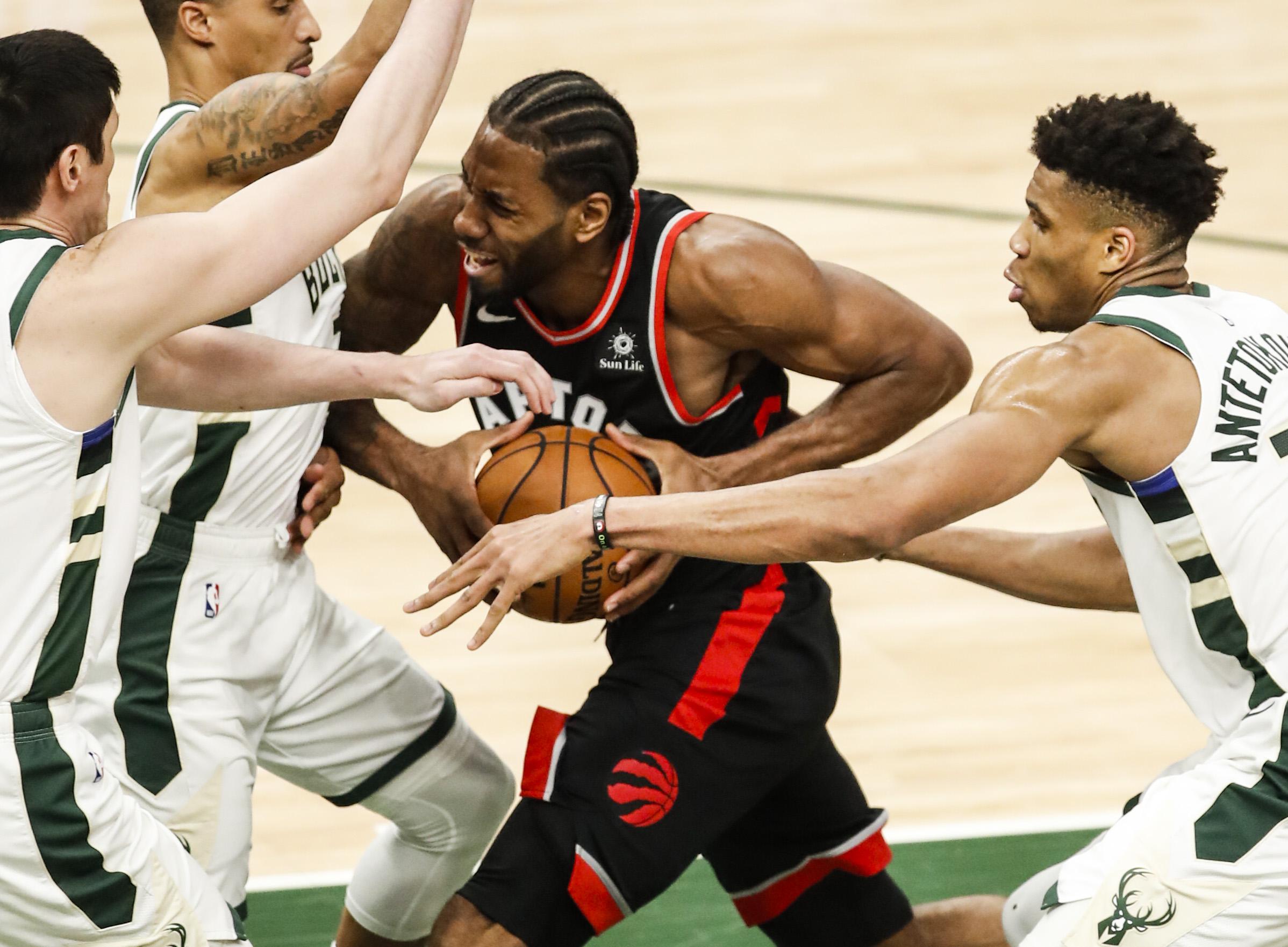 猛龙险胜凯尔特人,伦纳德关键时刻发威 猛龙险胜凯尔特人,伦纳德关键时刻发威